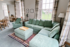 John McDouall Stuart View - Living room with full view of couches